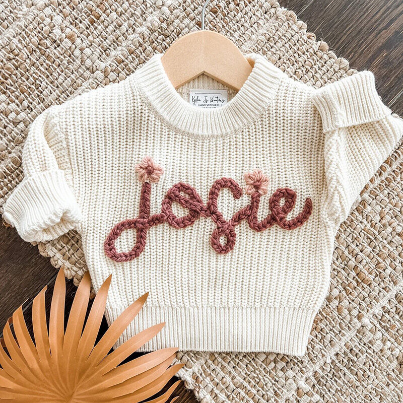 Personalized Handmade Name Sweater with Pink Flowers Decoration And Brown Text Graceful Present for Baby