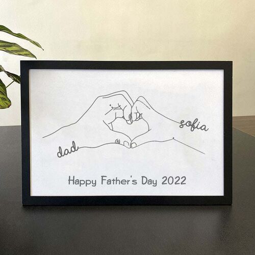Cadre personnalisé dessiné à la main avec des mains en forme de coeur pour papa et enfant