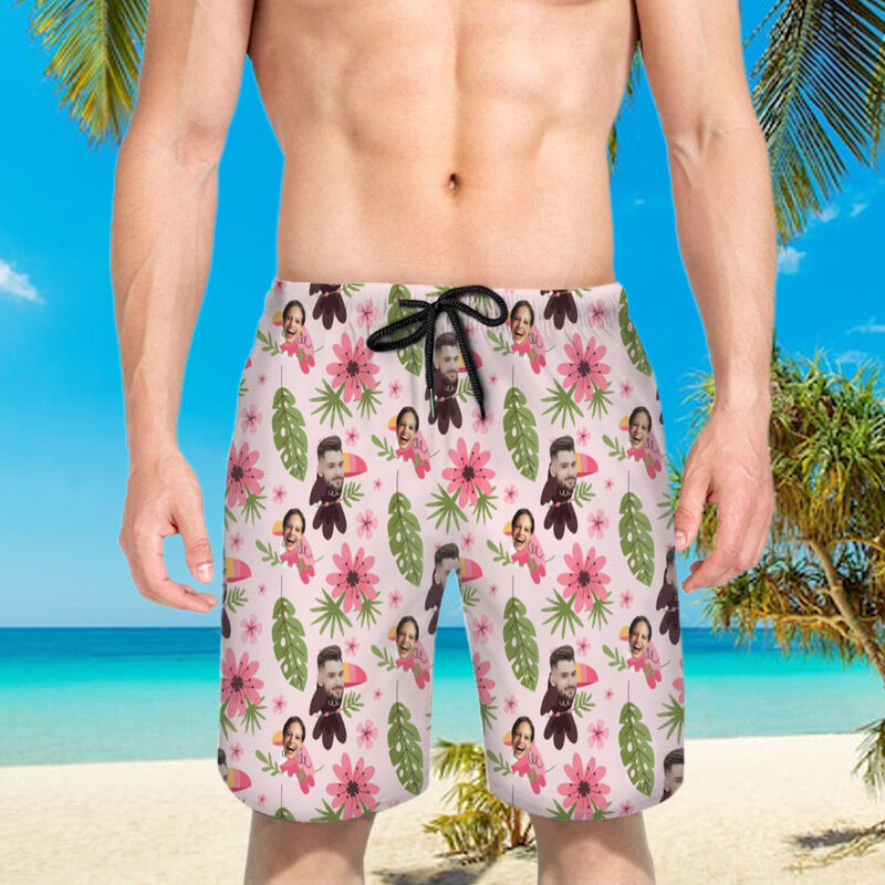 Pantaloncini da spiaggia da uomo con motivo di fiori rosa